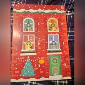 Festive Red Advent Calendar with Holiday Scenes
